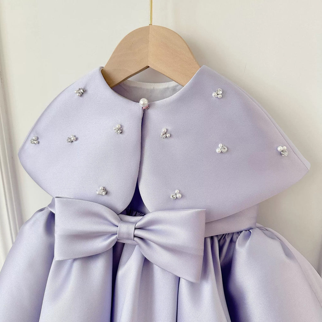 Children's formal dress in purple