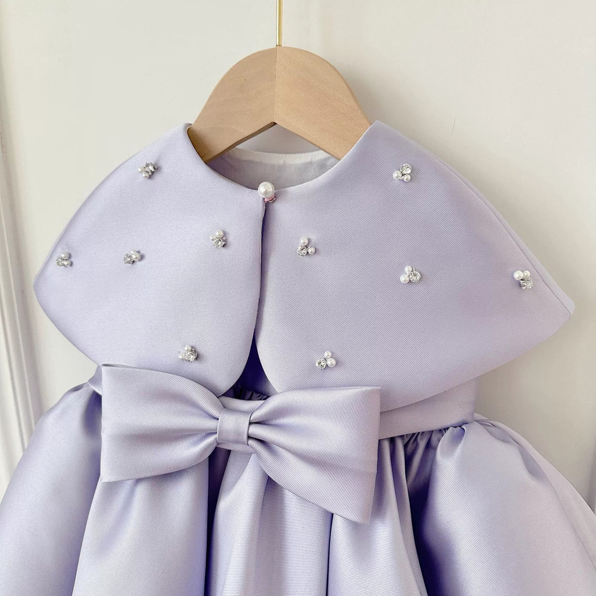 Children's formal dress in purple