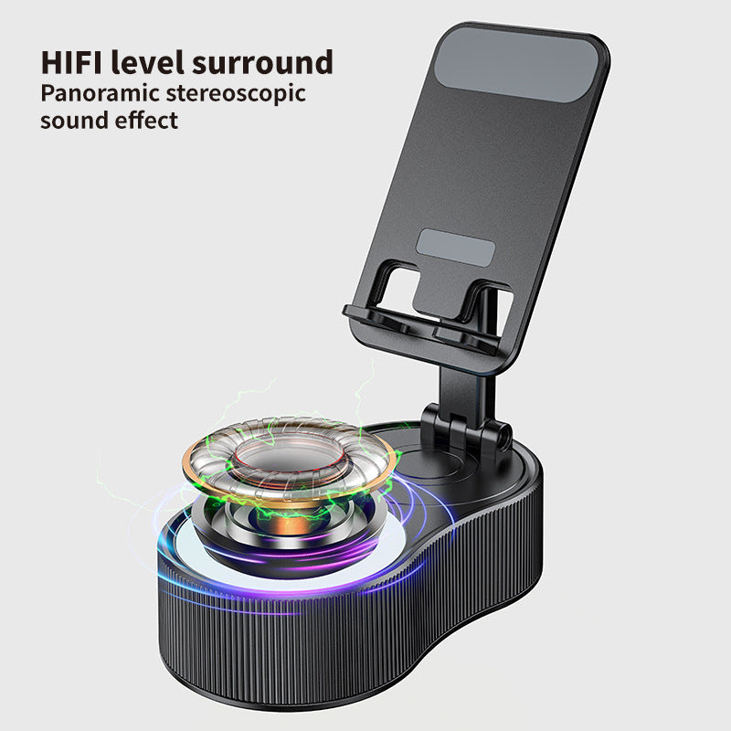 Inductive phone holder with speaker